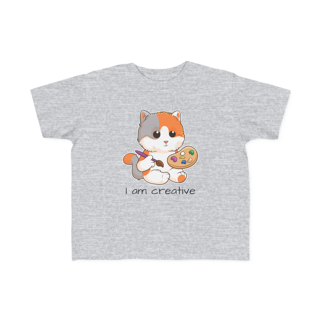 A short-sleeve heather grey shirt with a picture of a cat that says I am creative.