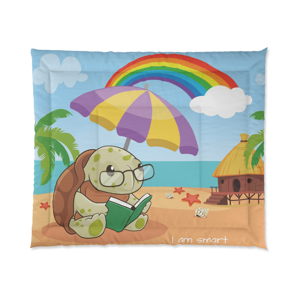 A 104 by 88 inch bed comforter with a scene of a turtle reading a book under an umbrella on a beach, a rainbow in the background, and the phrase "I am smart" along the bottom.