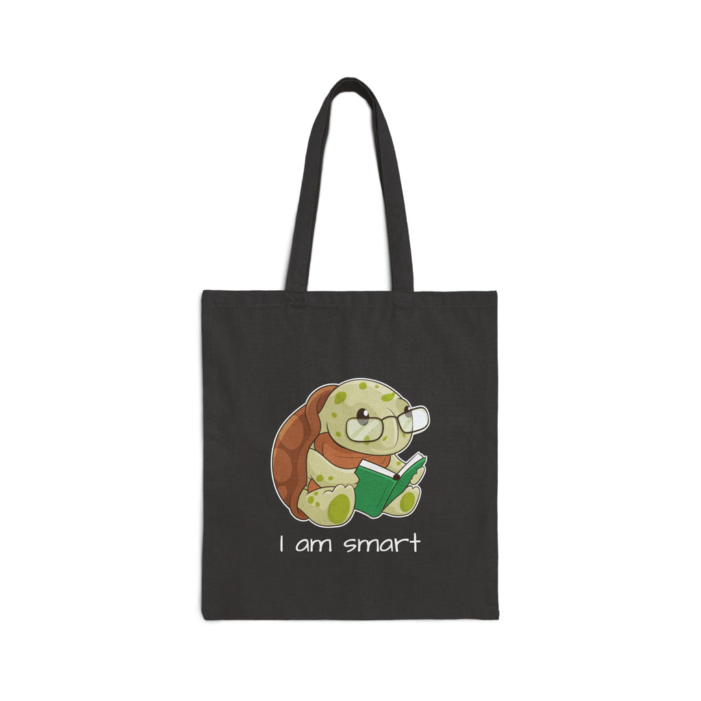 A black tote bag with a picture of a turtle that says I am smart.