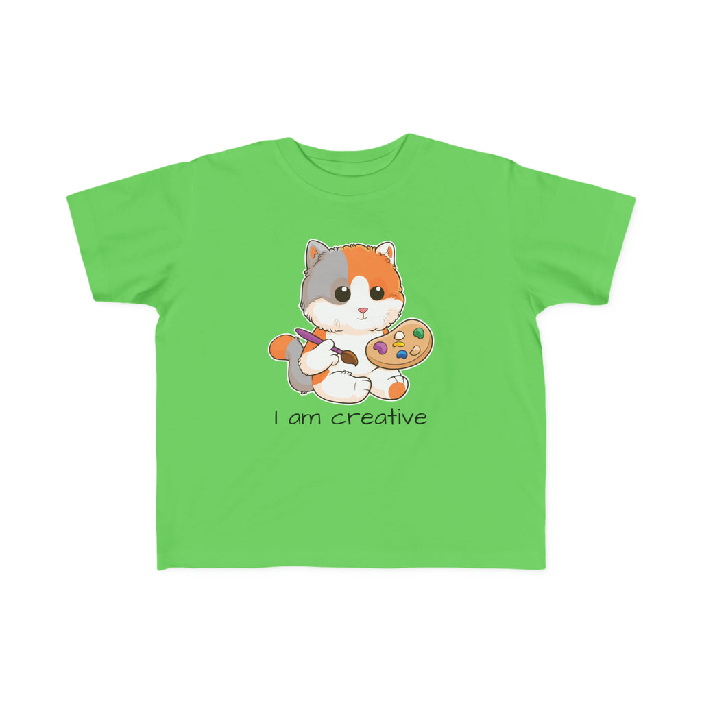 A short-sleeve green shirt with a picture of a cat that says I am creative.
