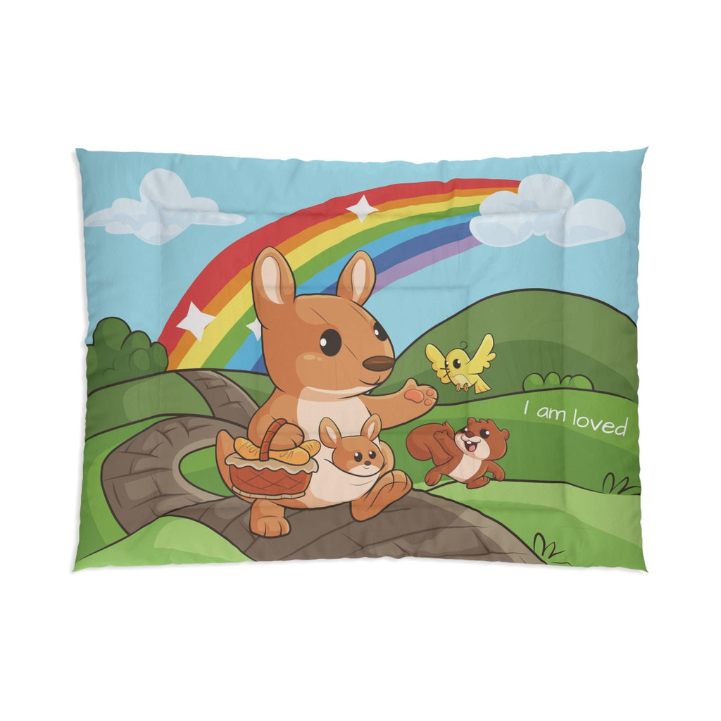A 68 by 92 inch bed comforter with a scene of a kangaroo walking along a path through rolling hills, a rainbow in the background, and the phrase "I am loved".