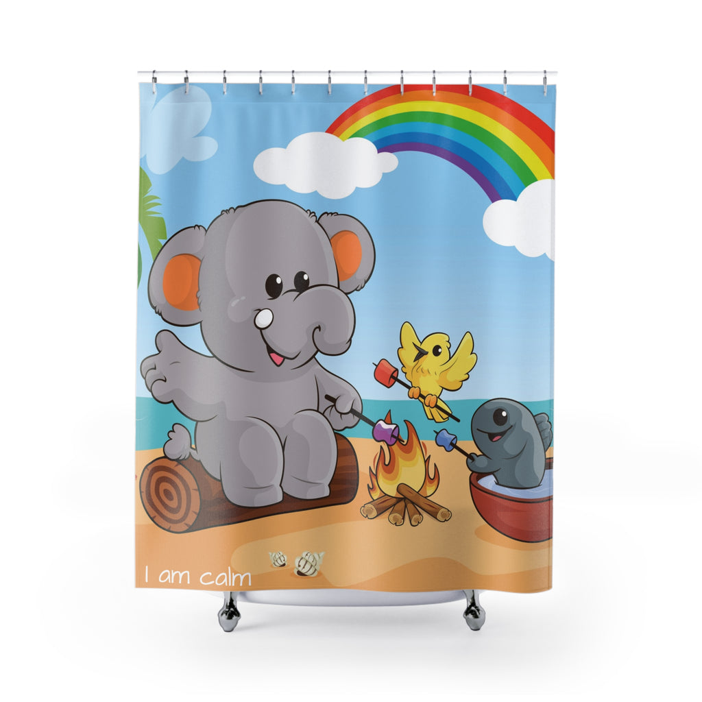 A shower curtain hanging from a rod in front of a stand-alone tub. The shower curtain has a scene of an elephant having a bonfire with a bird and fish on the beach, a rainbow in the background, and the phrase "I am calm" along the bottom.