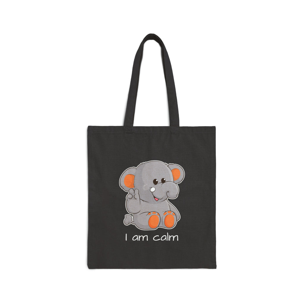 A black tote bag with a picture of an elephant that says I am calm.