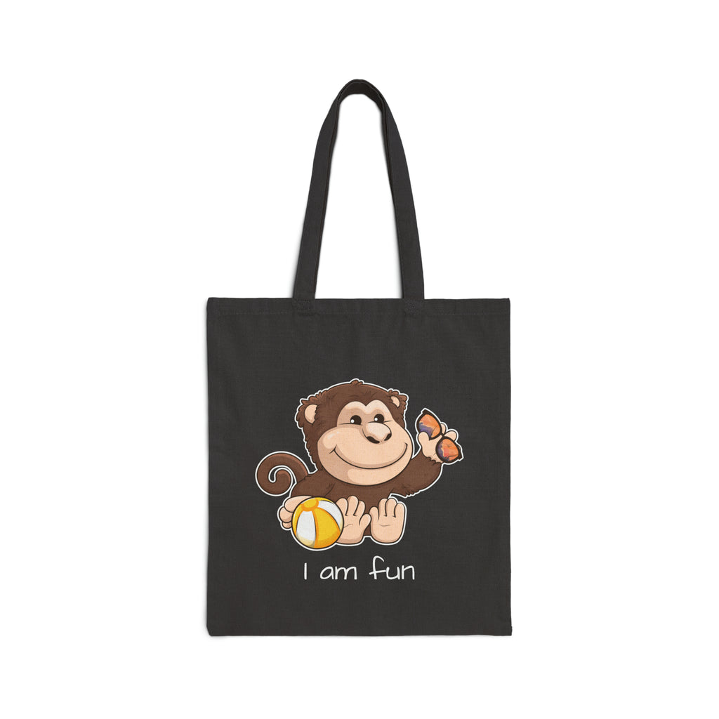 A black tote bag with a picture of a monkey that says I am fun.