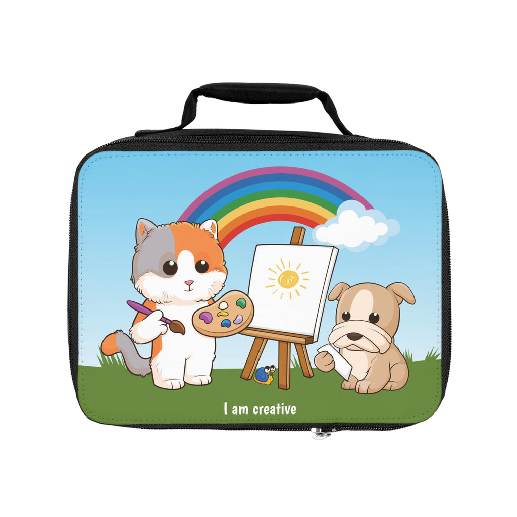 A rectangular lunch bag with a scene on the front of a cat painting on a canvas next to a dog, a rainbow in the background, and the phrase "I am creative" along the bottom.