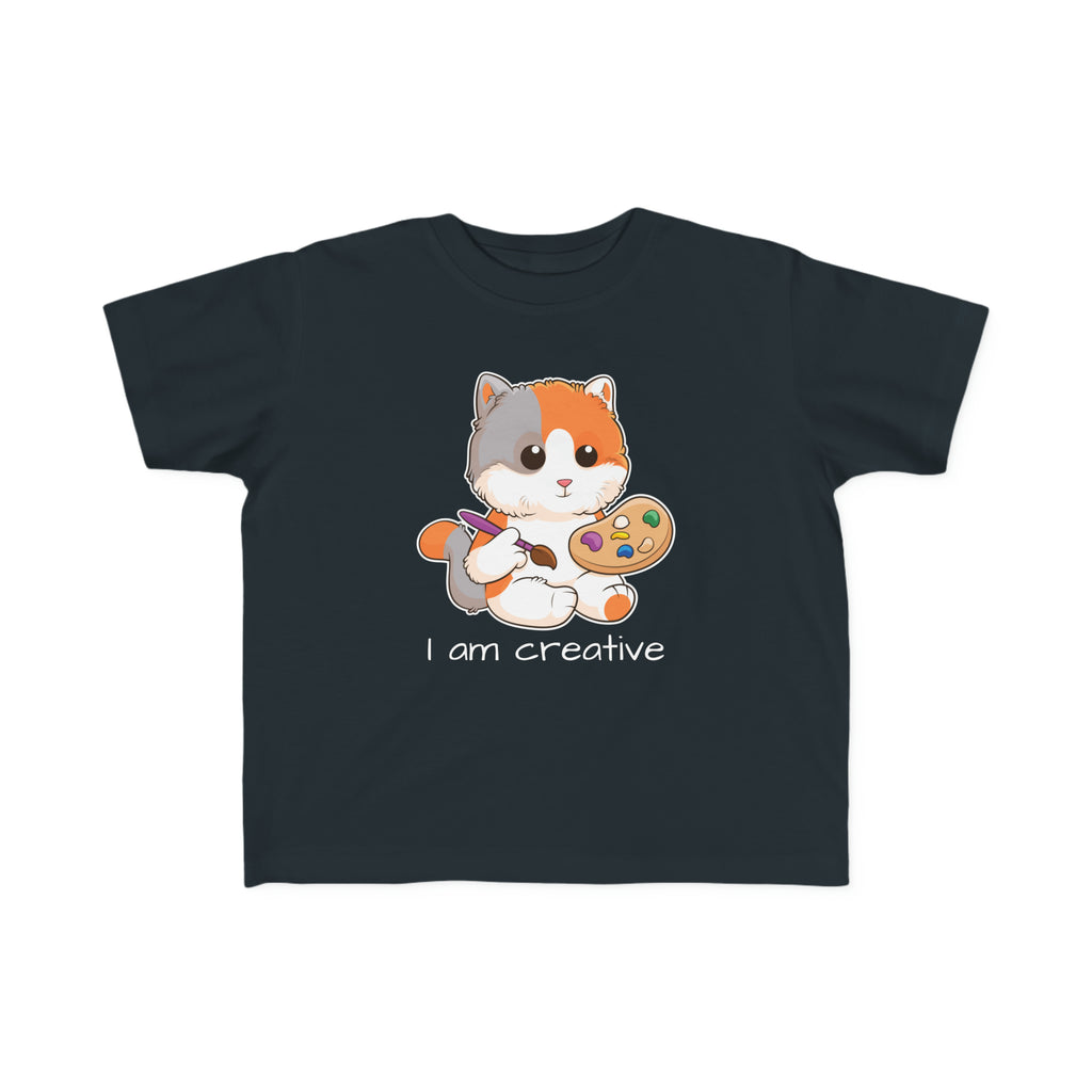 A short-sleeve black shirt with a picture of a cat that says I am creative.