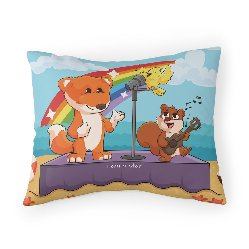 A pillowcase with a scene of a fox singing with a squirrel and bird on a stage on the beach, a rainbow in the background, and the phrase "I am a star" along the bottom.