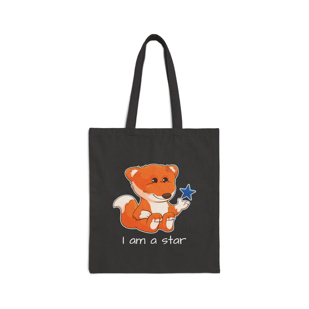 A black tote bag with a picture of a fox that says I am a star.
