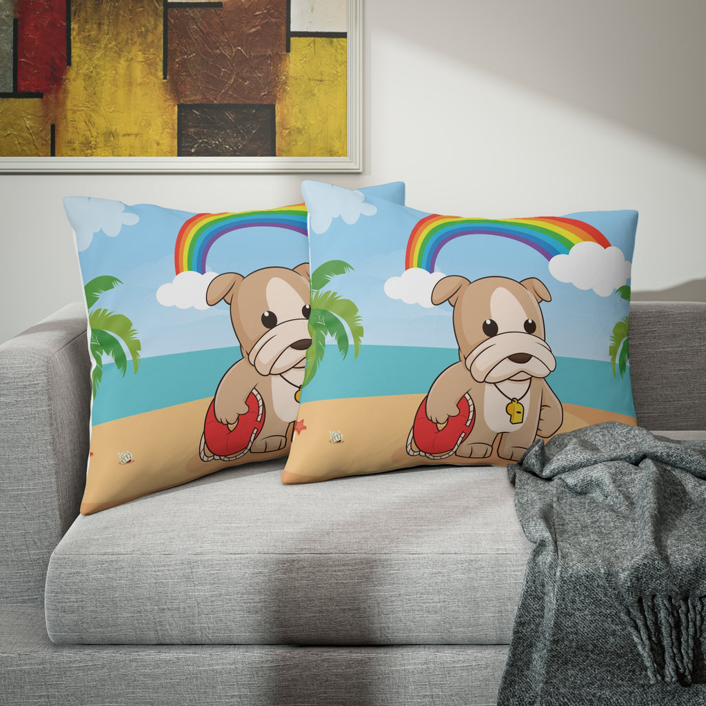 Two pillows sitting on a grey couch. The pillows have on pillowcases with a scene of a dog lifeguard standing on the beach, a rainbow in the background, and the phrase "I am loyal" along the bottom.