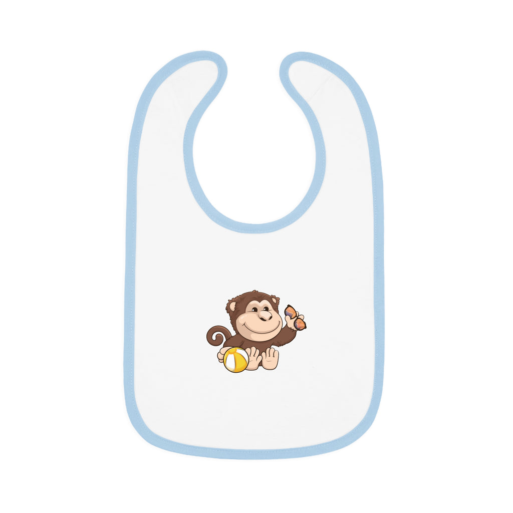 A white baby bib with light blue trim and a small picture of a monkey.