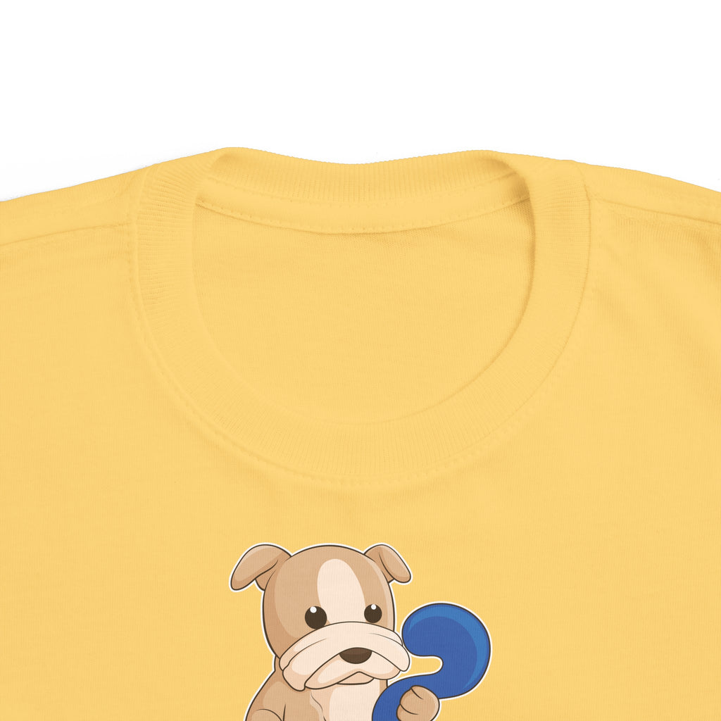 A close-up of the crew neckline of a short-sleeve yellow shirt with a picture of a dog that says Loyal Best Friend.