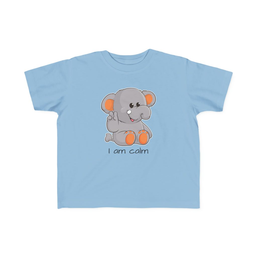 A short-sleeve light blue shirt with a picture of an elephant that says I am calm.