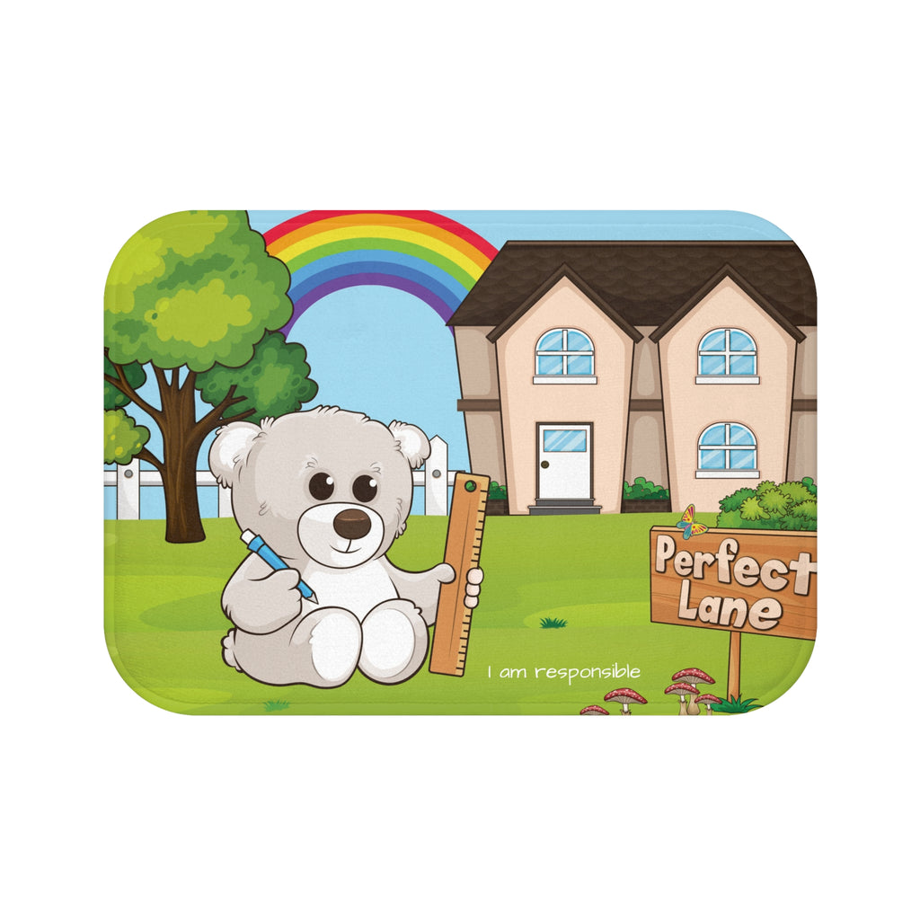 A 24 by 17 inch bath mat that has a scene of a bear in the yard of its house with a rainbow in the background and the phrase "I am responsible" along the bottom.