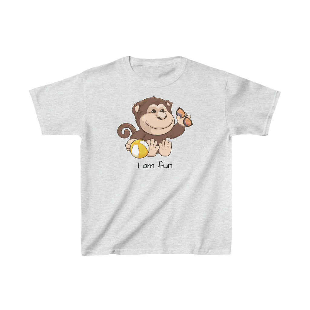 A short-sleeve light grey shirt with a picture of a monkey that says I am fun.