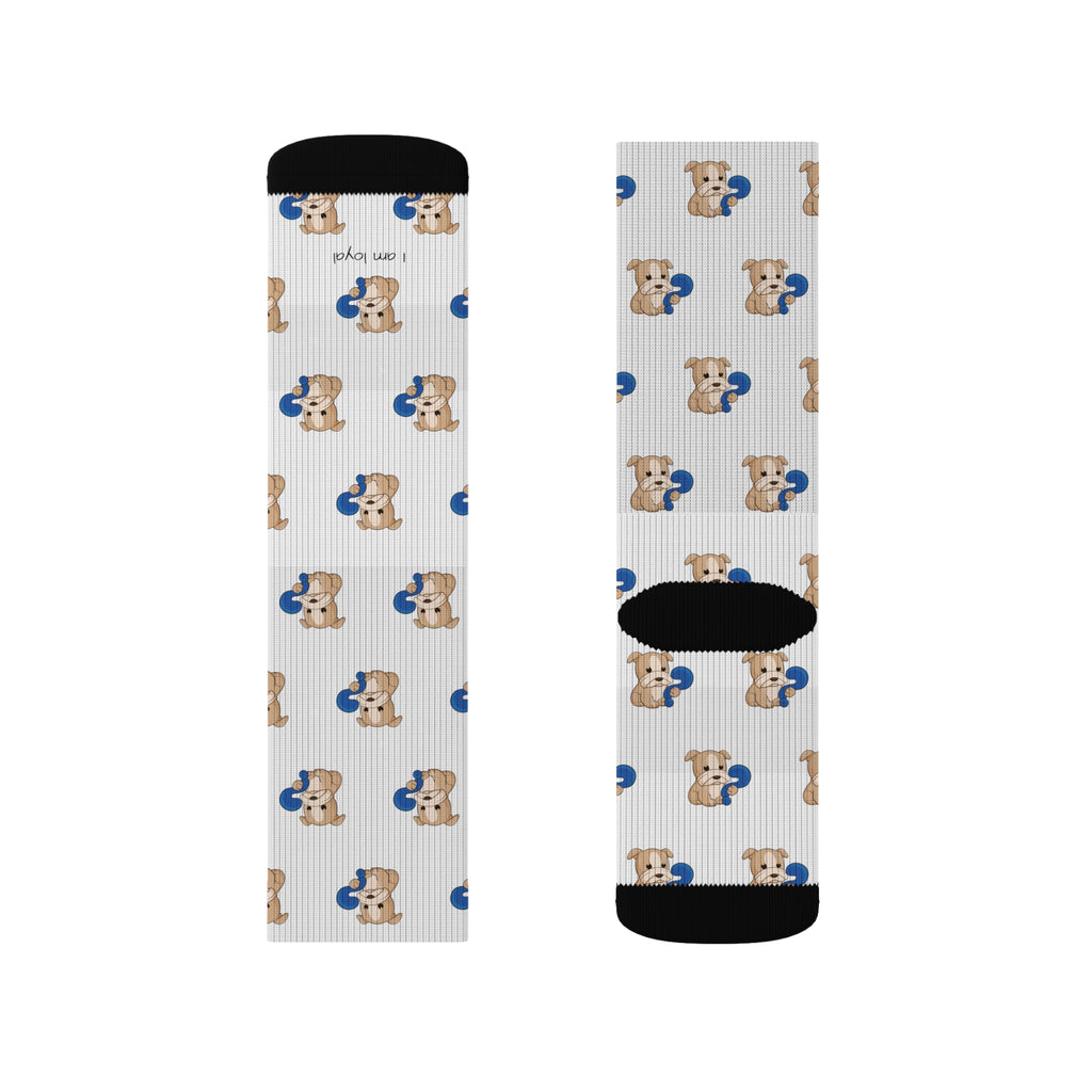 A pair of crew-length white socks with black toes and heels and a repeating pattern of a dog.