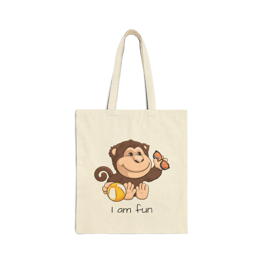 A natural tan tote bag with a picture of a monkey that says I am fun.