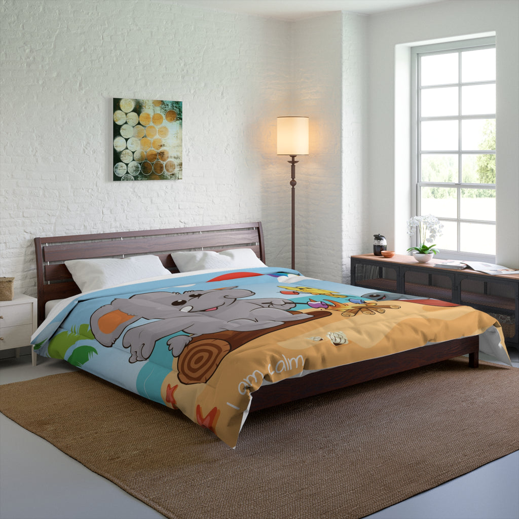 A 104 by 88 inch bed comforter with a scene of an elephant having a bonfire with a bird and fish on the beach, a rainbow in the background, and the phrase "I am calm" along the bottom. The comforter covers a queen-sized bed.