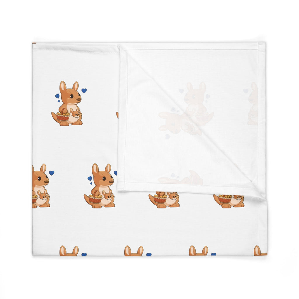 A white swaddle blanket with a repeating pattern of a kangaroo. The blanket is folded into a square.