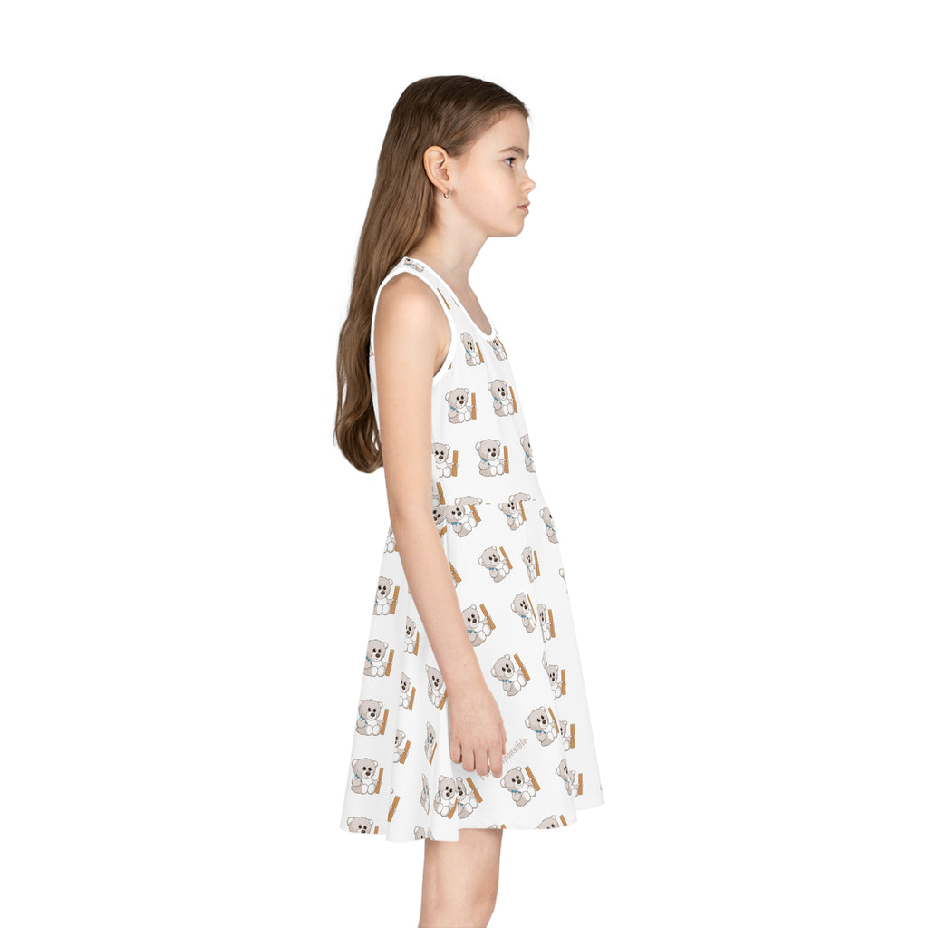 Right side-view of a girl wearing a sleeveless white dress with a repeating pattern of a bear.