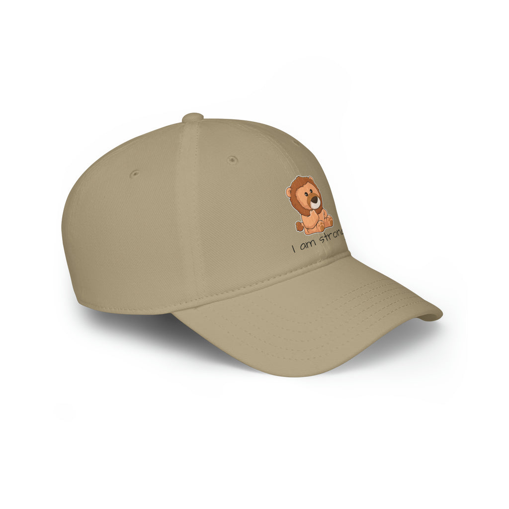 Side-view of a khaki baseball hat with a picture of a lion that says I am strong.