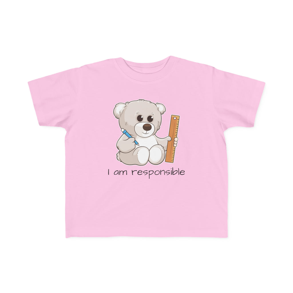A short-sleeve light pink shirt with a picture of a bear that says I am responsible.