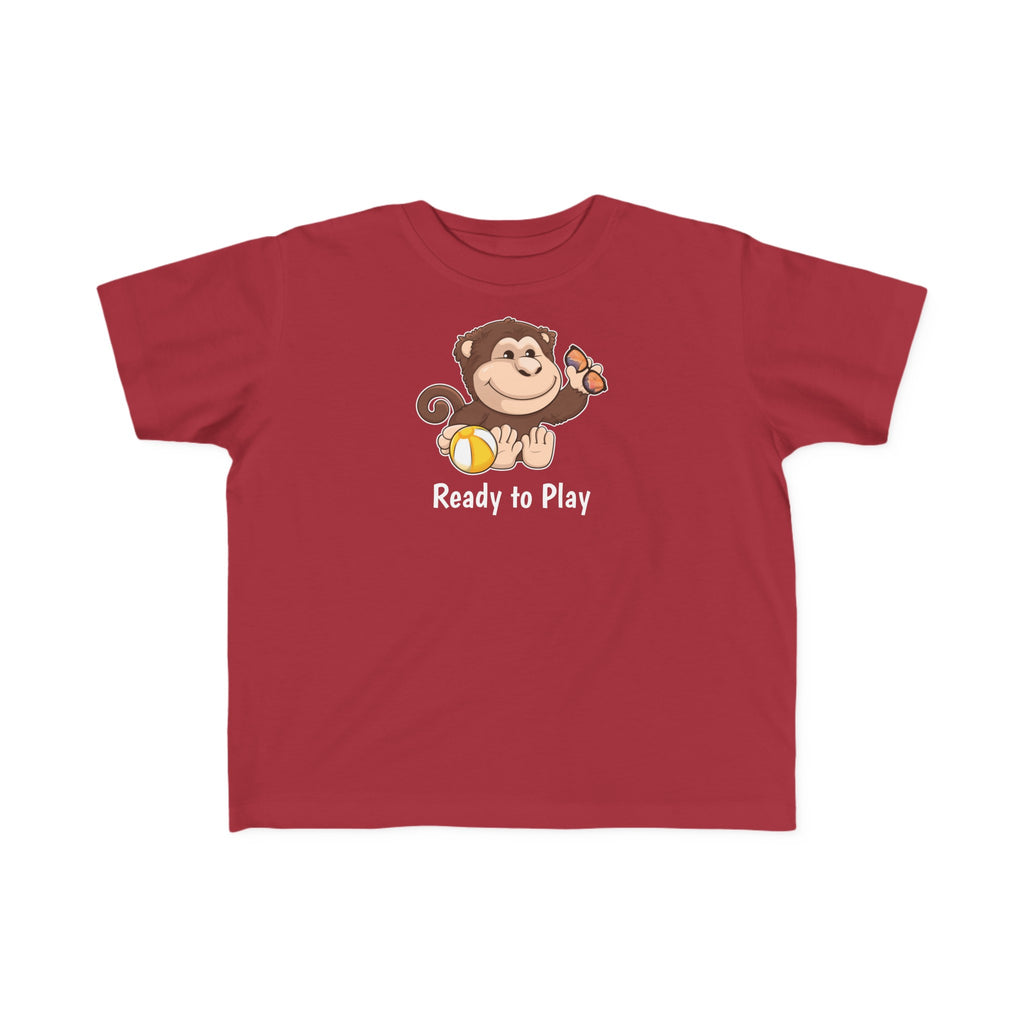 A short-sleeve garnet red shirt with a picture of a monkey that says Ready to Play.