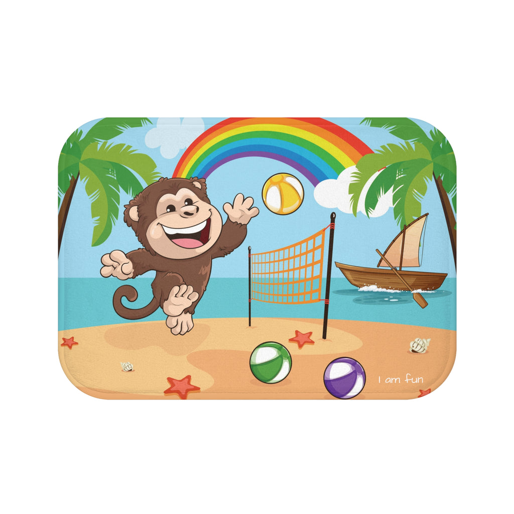 A 24 by 17 inch bath mat that has a scene of a monkey playing volleyball on a beach with a rainbow in the background and the phrase "I am fun" along the bottom.