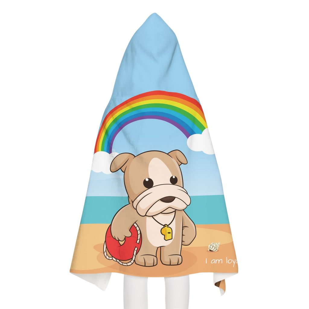 Back-view of a girl wearing a hooded towel. The towel has a scene of a dog lifeguard standing on the beach, a rainbow in the background, and the phrase "I am loyal" along the bottom.