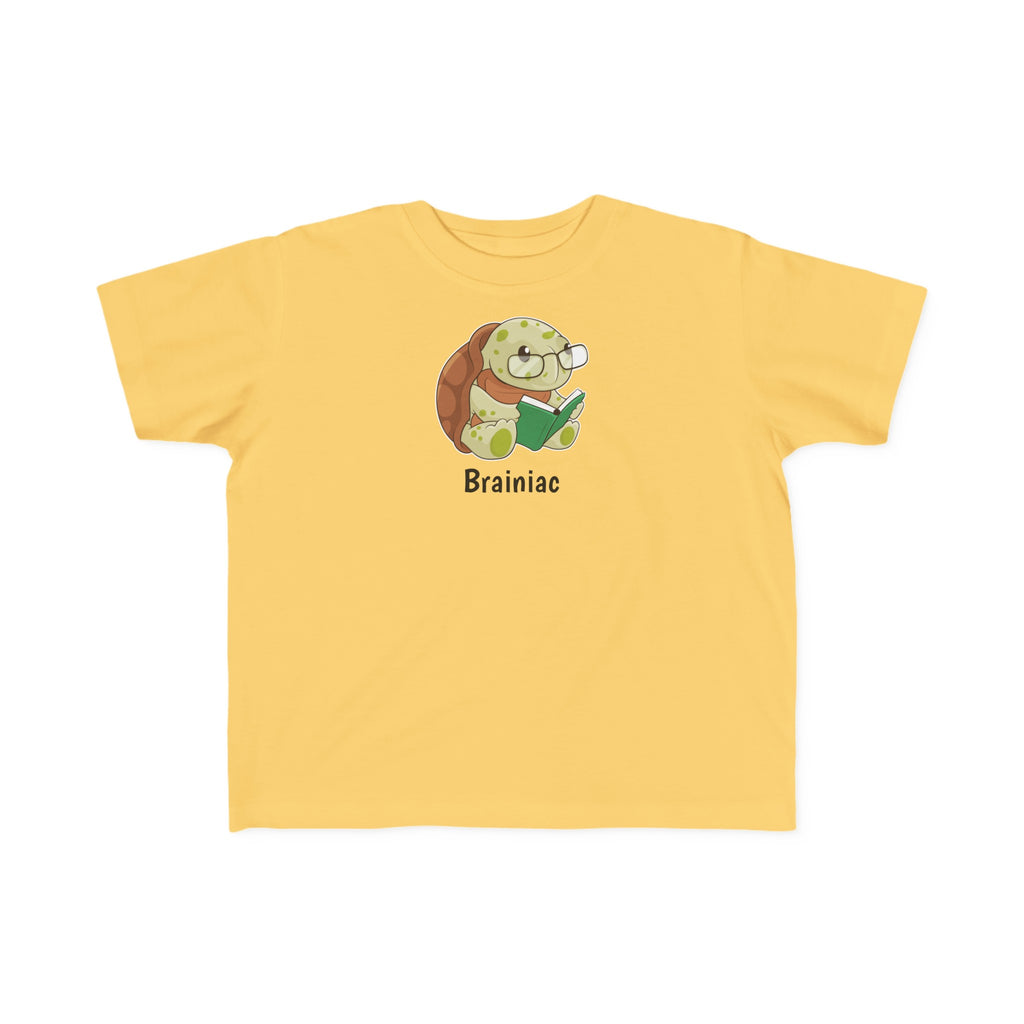 A short-sleeve yellow shirt with a picture of a turtle that says Brainiac.