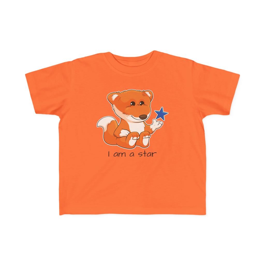 A short-sleeve orange shirt with a picture of a fox that says I am a star.