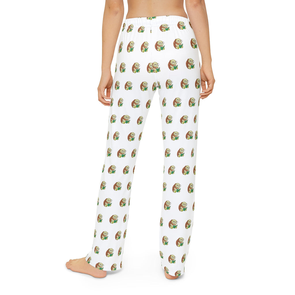 Back-view of a kid wearing white pajama pants with a repeated pattern of a turtle.