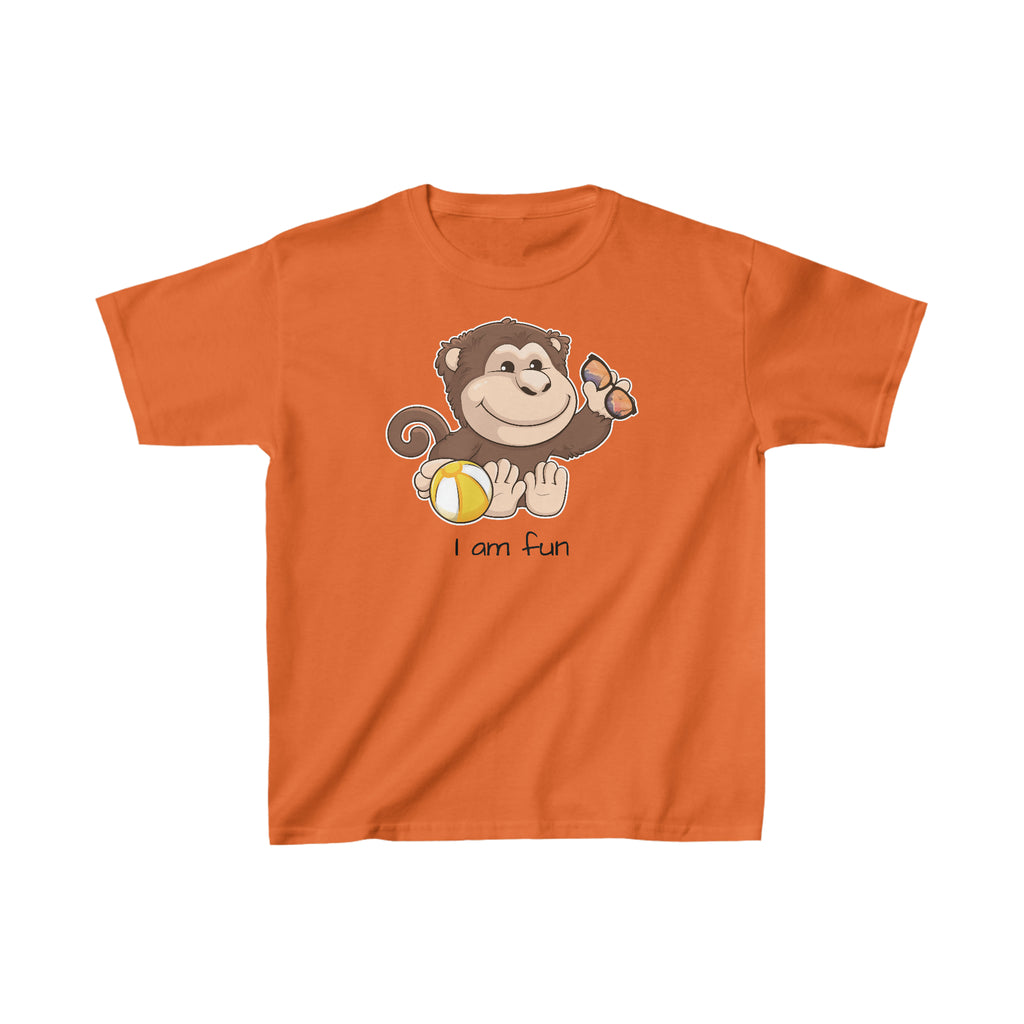 A short-sleeve orange shirt with a picture of a monkey that says I am fun.