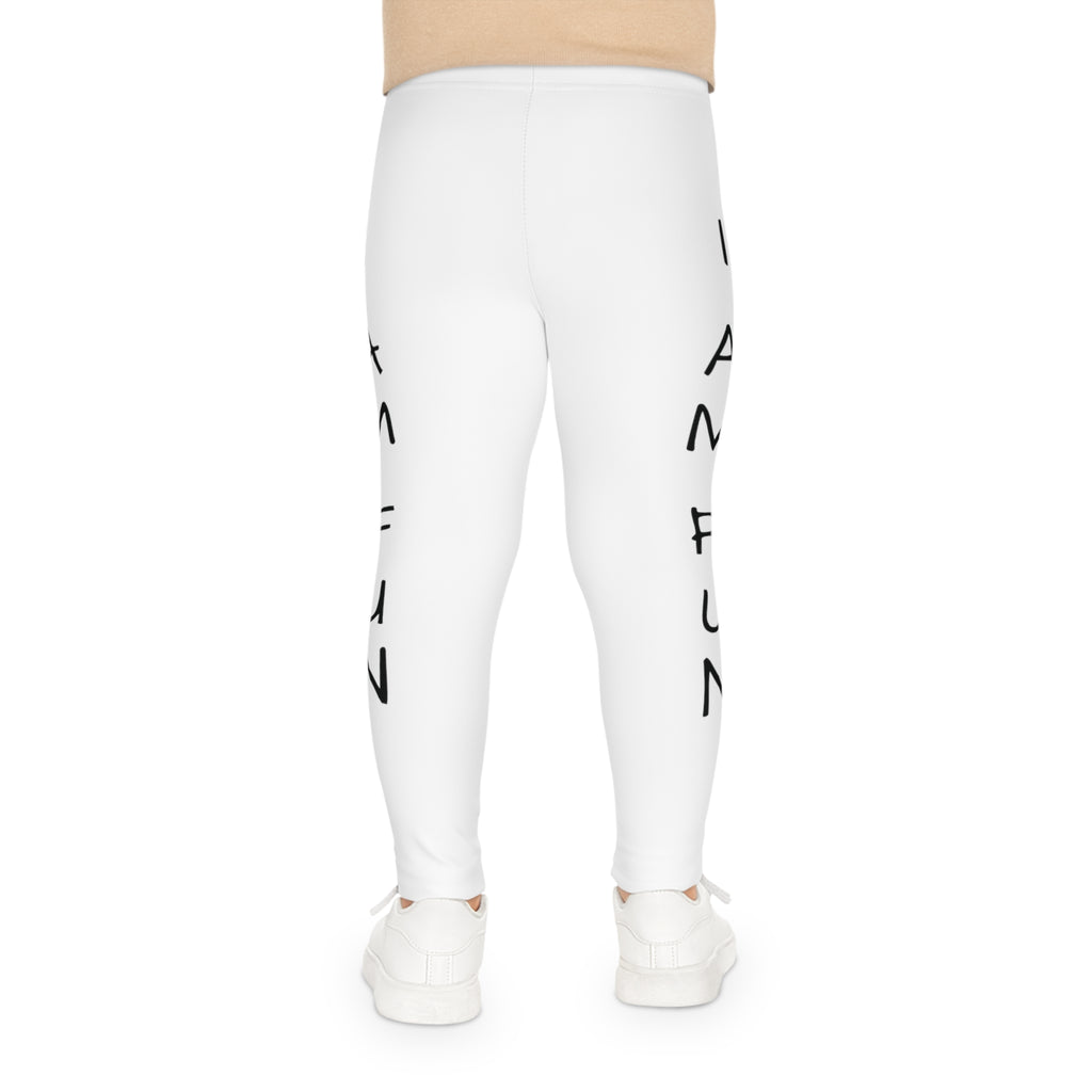 Back-view of a child wearing white leggings with the phrase "I am fun" read top to bottom on the side of each leg.