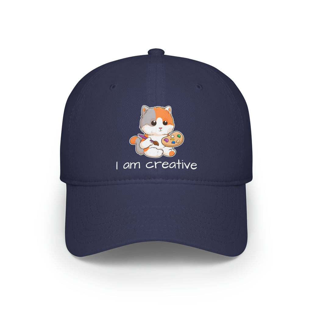 Front-view of a navy blue baseball hat with a picture of a cat that says I am creative.