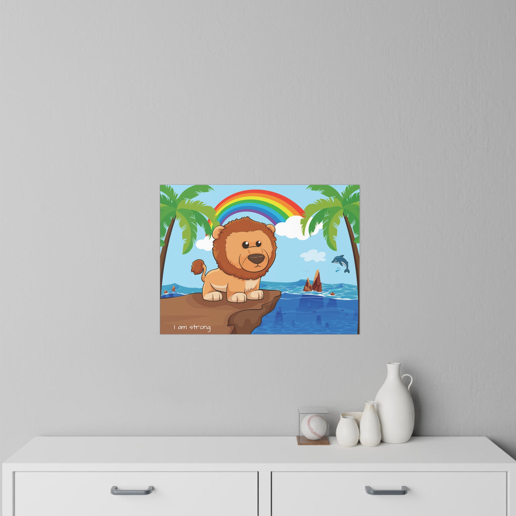 A 24 by 18 inch wall decal on a grey wall above a dresser. The wall decal has a scene of a lion standing on a cliff over the ocean, a rainbow in the background, and the phrase "I am strong" along the bottom.