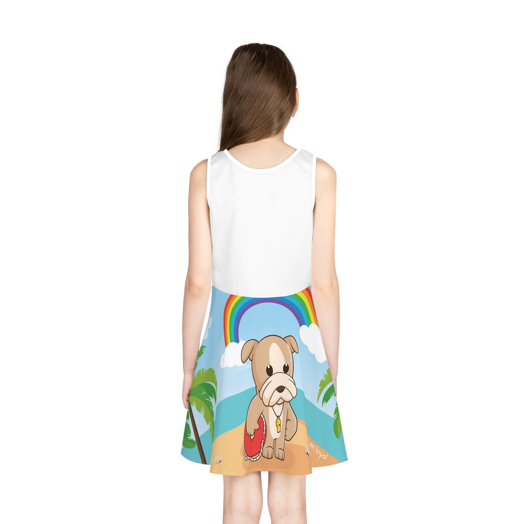 Back-view of a girl wearing a sleeveless dress. The dress has a white top and the skirt features a scene of a dog lifeguard standing on the beach and the phrase "I am loyal".