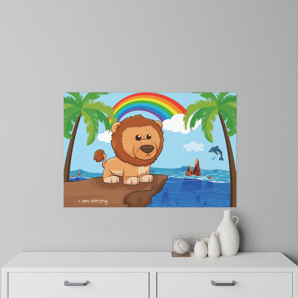 A 36 by 24 inch wall decal on a grey wall above a dresser. The wall decal has a scene of a lion standing on a cliff over the ocean, a rainbow in the background, and the phrase "I am strong" along the bottom.