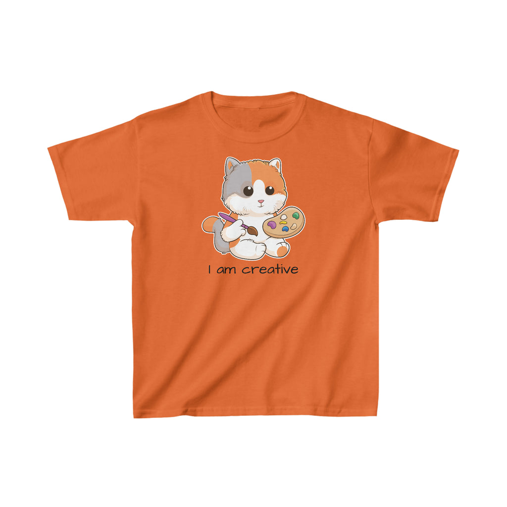 A short-sleeve orange shirt with a picture of a cat that says I am creative.