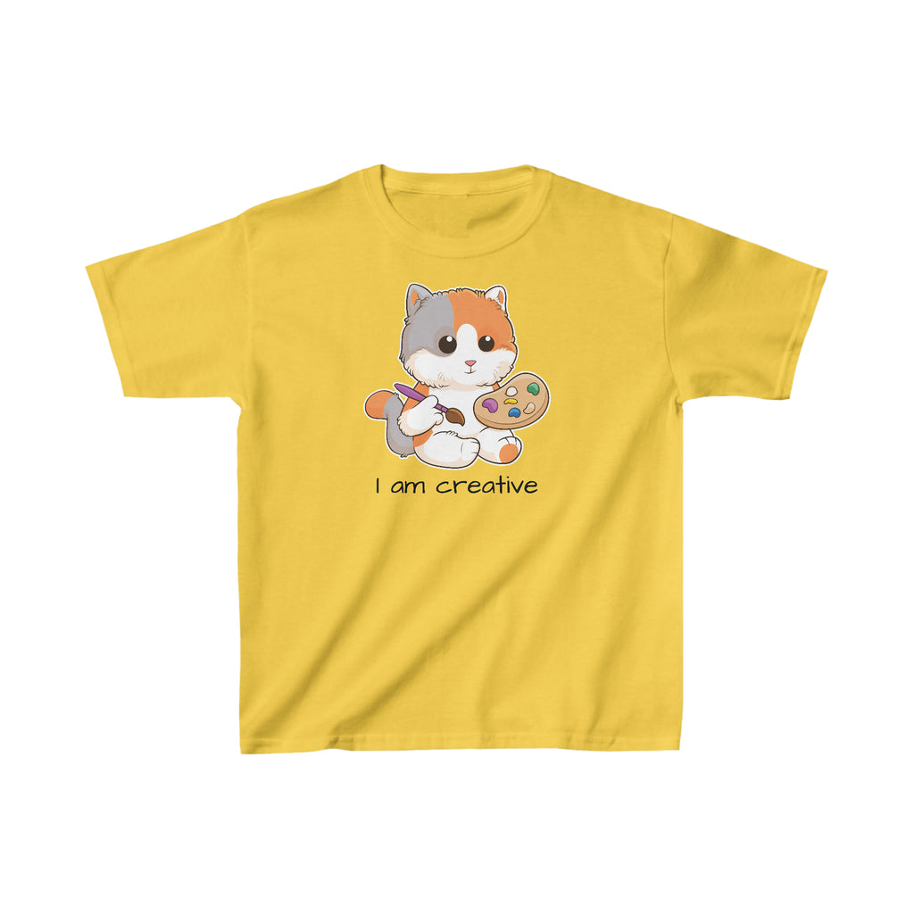 A short-sleeve yellow shirt with a picture of a cat that says I am creative.