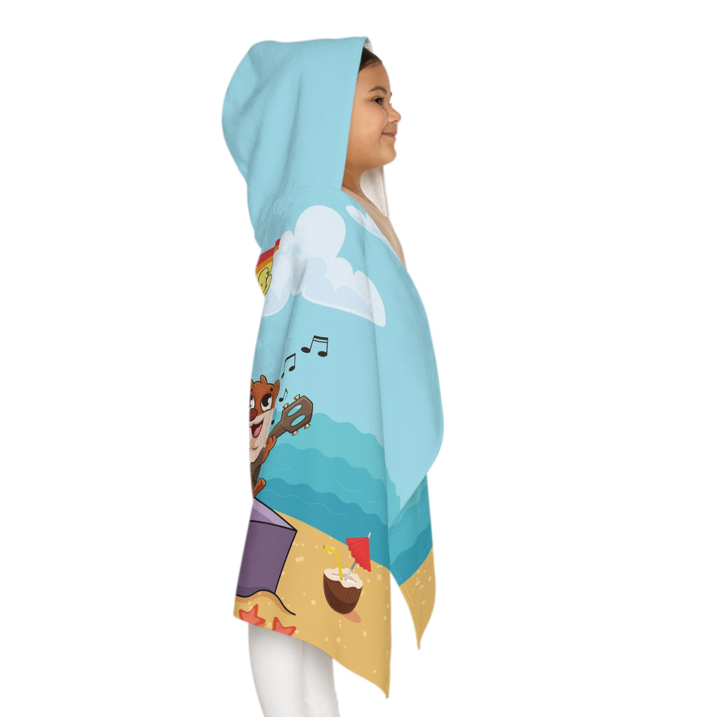 Right side-view of a girl wearing a hooded towel and holding it closed around her. The towel has a scene of a fox singing with a bird and squirrel on a stage on the beach, a rainbow in the background, and the phrase "I am a star" along the bottom.