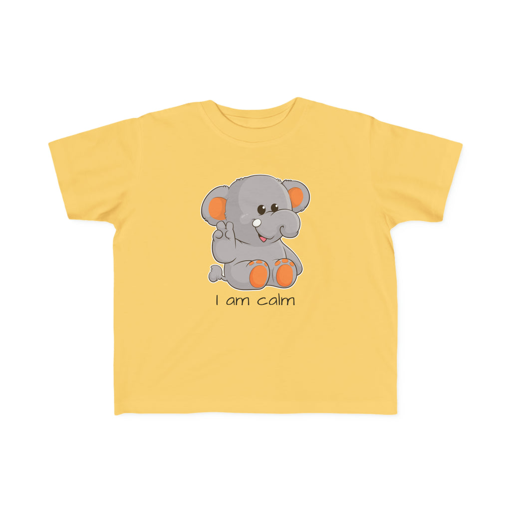 A short-sleeve yellow shirt with a picture of an elephant that says I am calm.