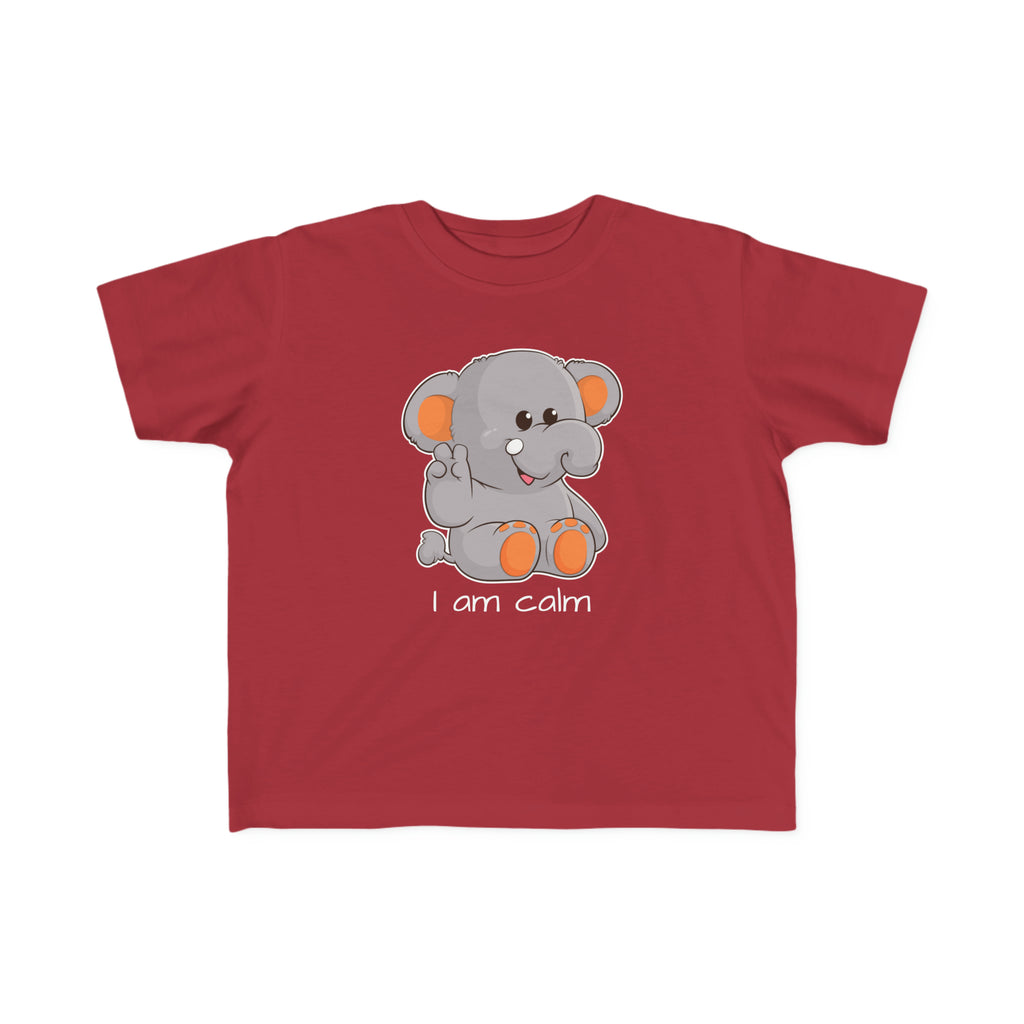 A short-sleeve garnet red shirt with a picture of an elephant that says I am calm.