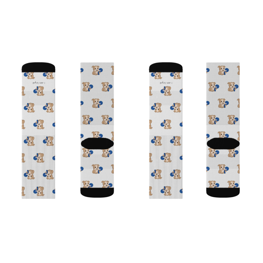 A pair of socks, showing the top and bottom of both. The crew-length socks are white with black toes and heels and a repeating pattern of a dog.