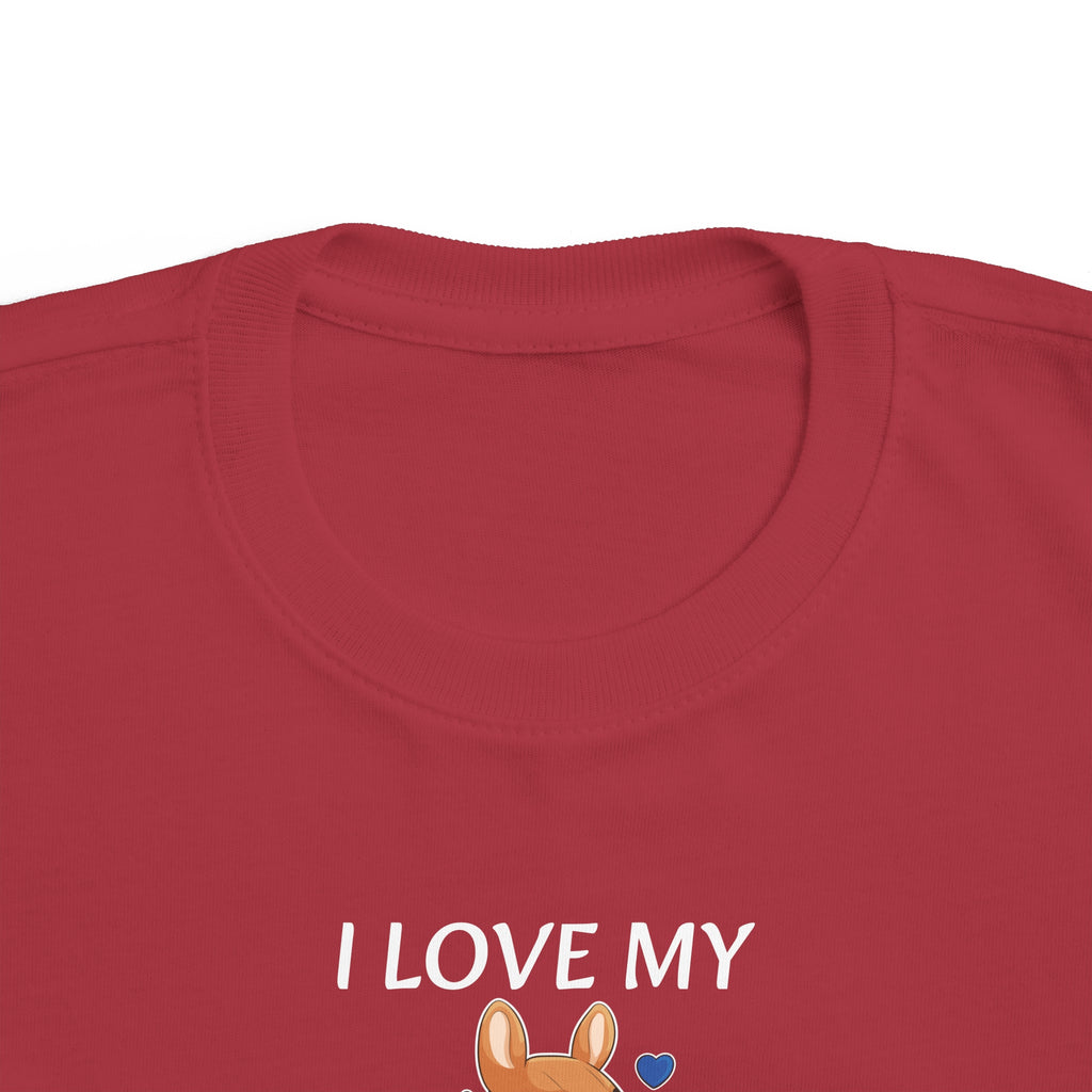 A close-up of the crew neckline of a short-sleeve garnet red shirt with a picture of a kangaroo that says I Love My Mom.