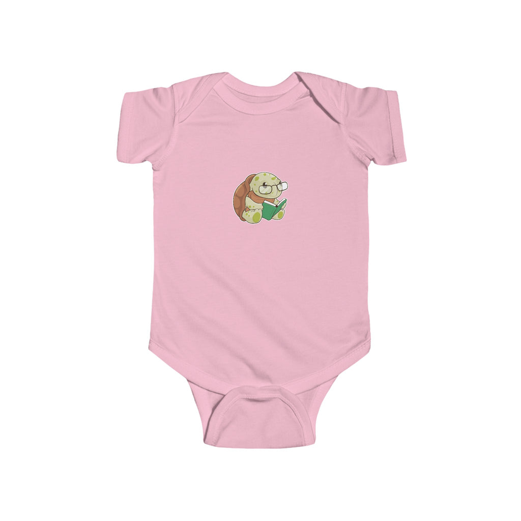 A light pink baby onesie with a picture of a turtle.