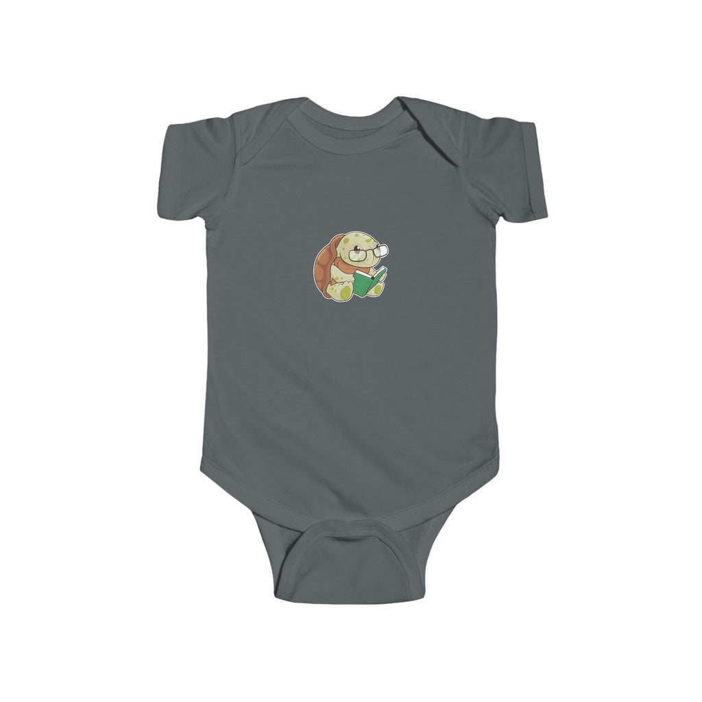 A charcoal grey baby onesie with a picture of a turtle.