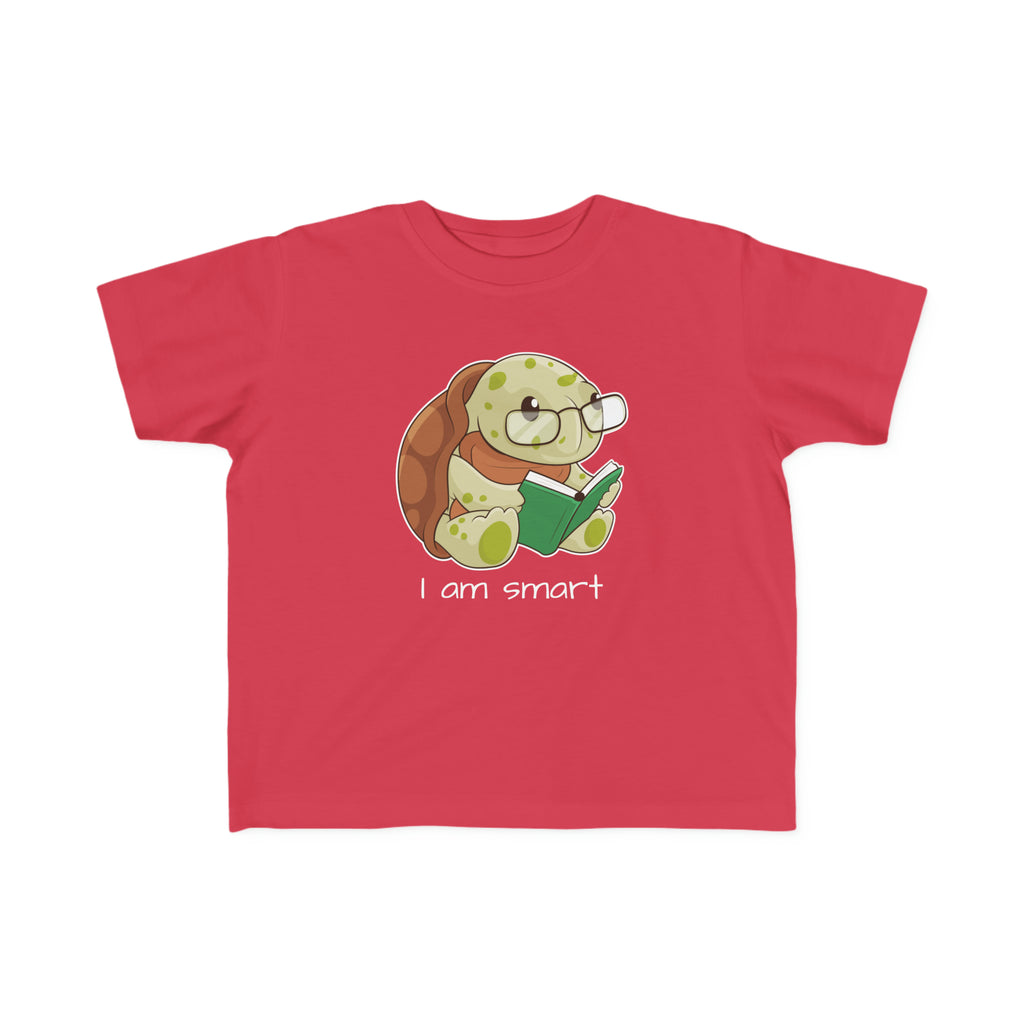 A short-sleeve red shirt with a picture of a turtle that says I am smart.
