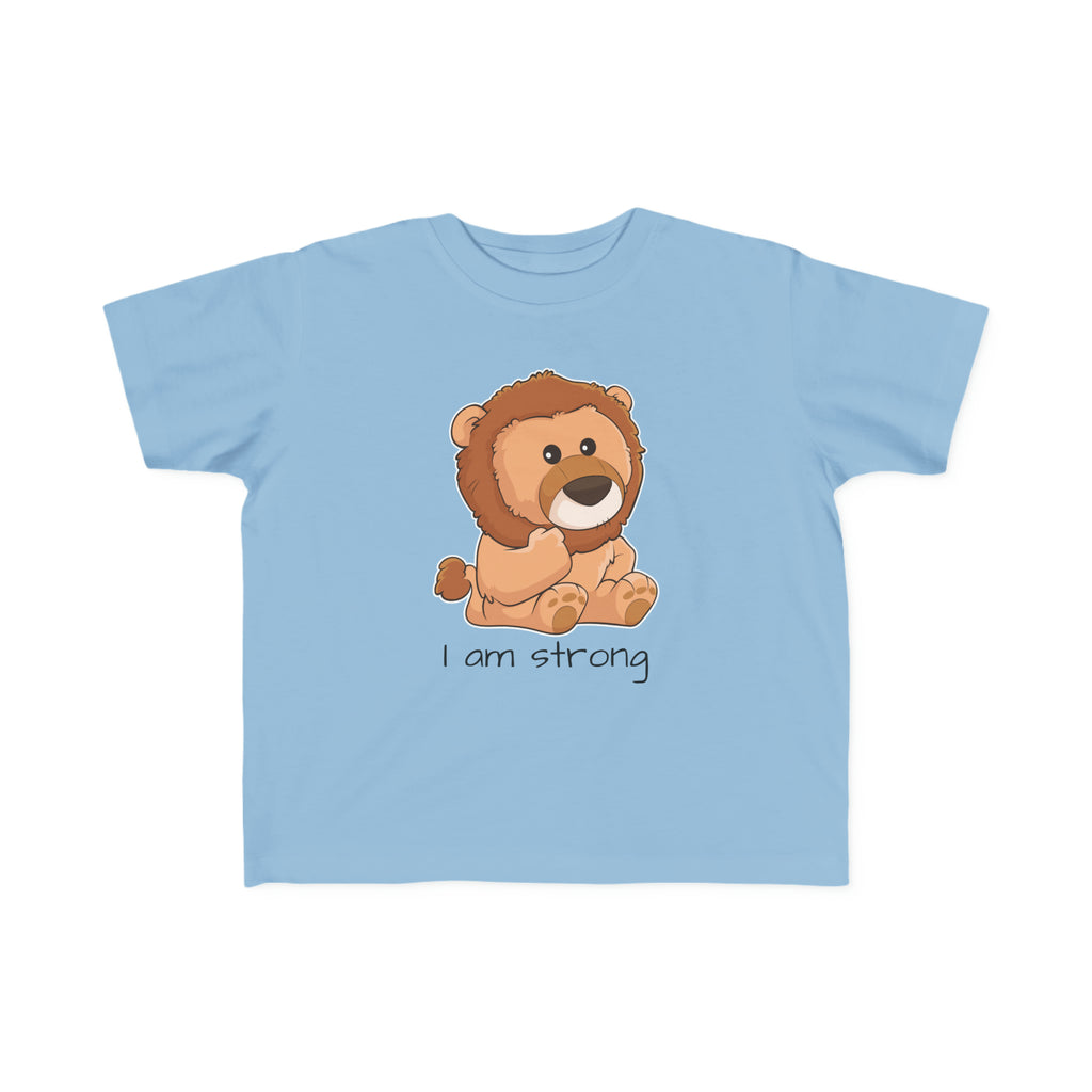 A short-sleeve light blue shirt with a picture of a lion that says I am strong.