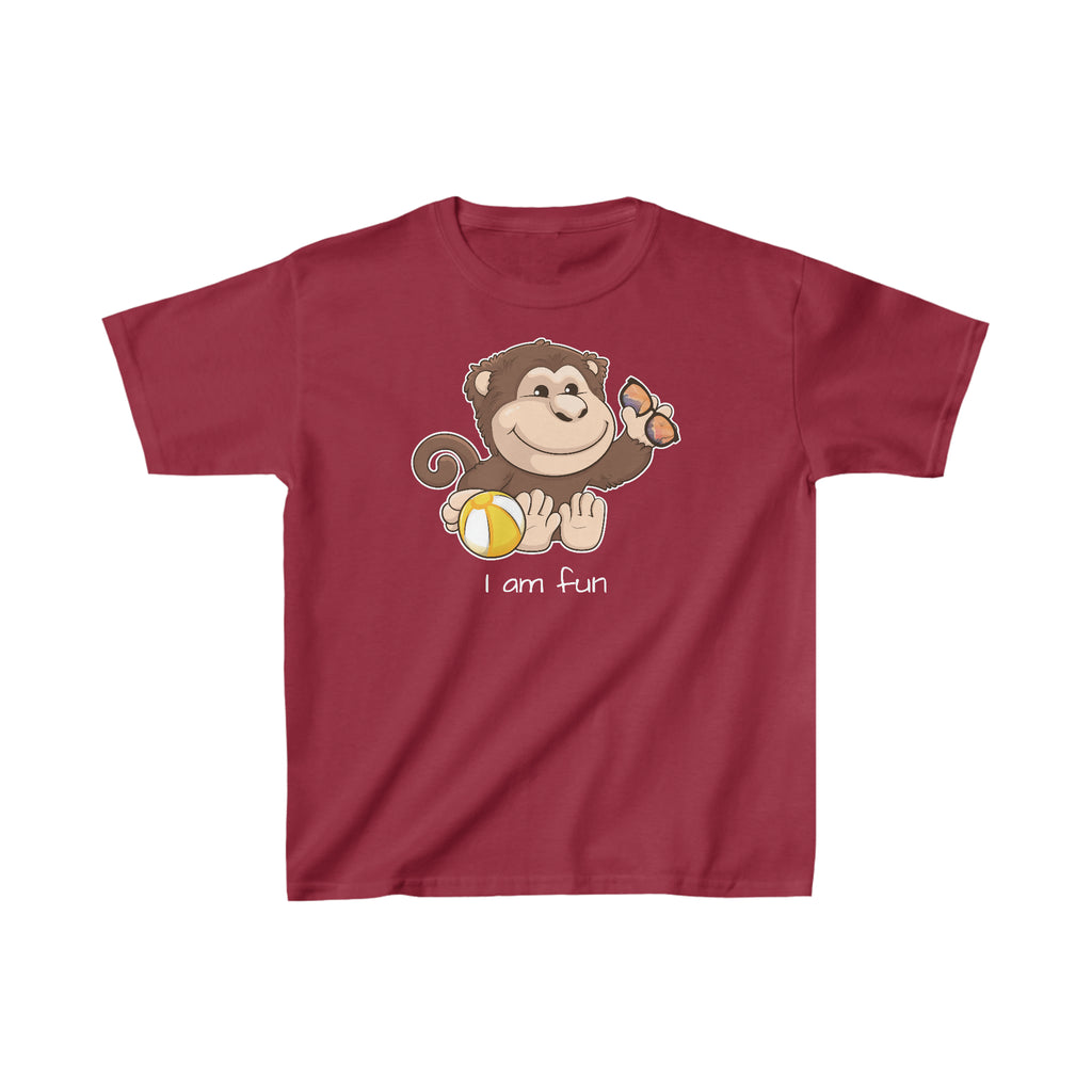 A short-sleeve cardinal red shirt with a picture of a monkey that says I am fun.