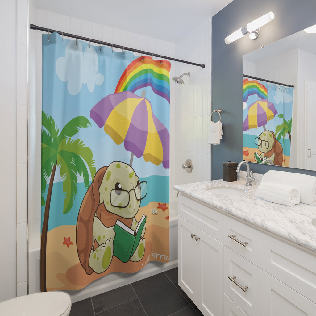 A shower curtain hanging from a rod in front of a built-in tub in a bathroom. The shower curtain has a scene of a turtle reading a book under an umbrella on a beach with a rainbow in the background and the phrase "I am smart" along the bottom.